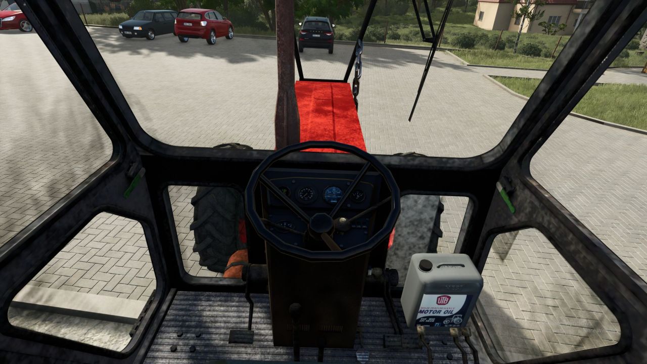 Effizienter Forsttraktor UTB 1010 Forestry mit Schaufel und fester Kamera für FS25