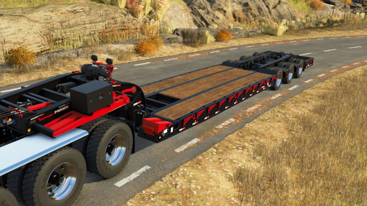 Effizienter Tieflader Kalyn Siebert VersaMaxx für schwere Maschinen in FS25