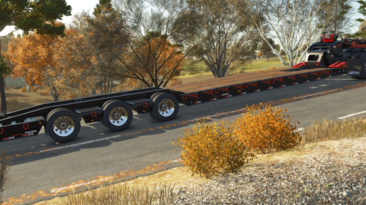 Effizienter Tieflader Kalyn Siebert VersaMaxx für schwere Maschinen in FS25