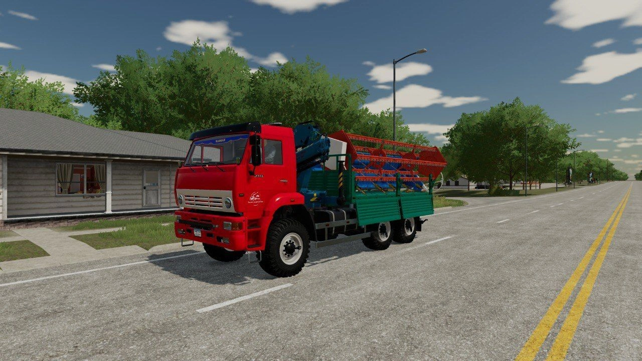 Вантажівка KamAZ-6522 з маніпулятором для Farming Simulator 22