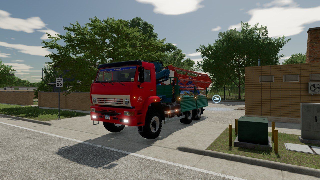 Вантажівка KamAZ-6522 з маніпулятором для Farming Simulator 22